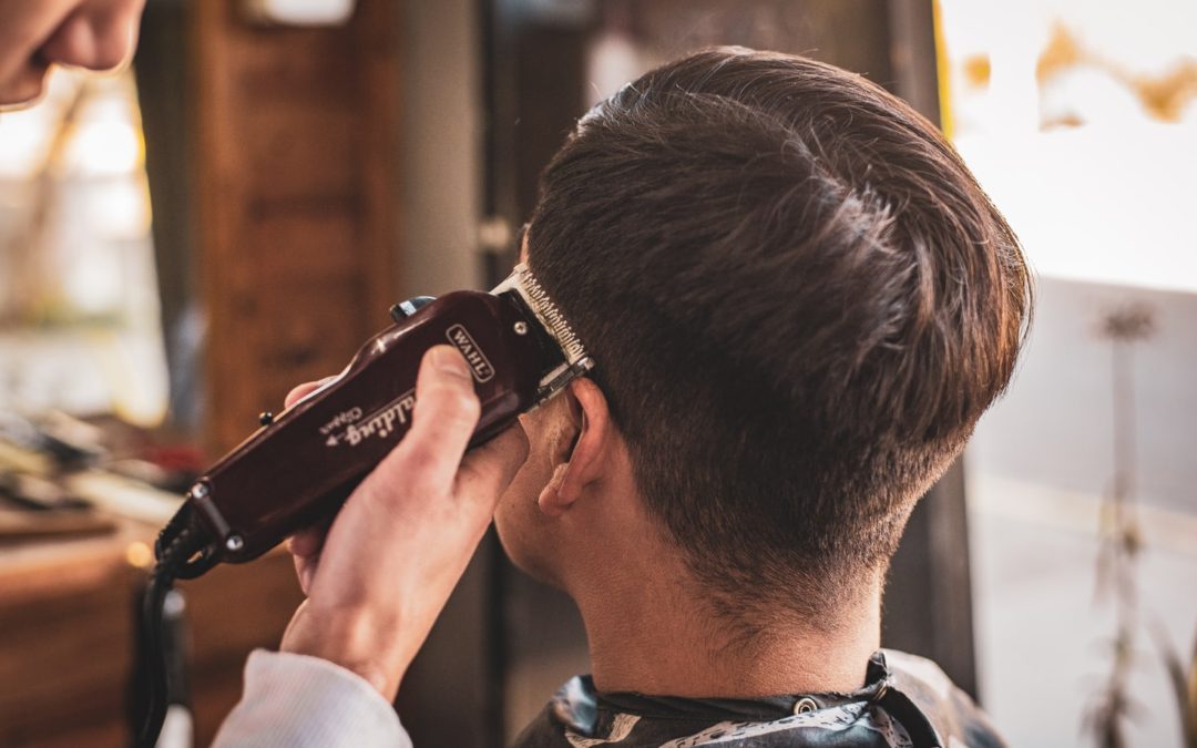 man having haircut